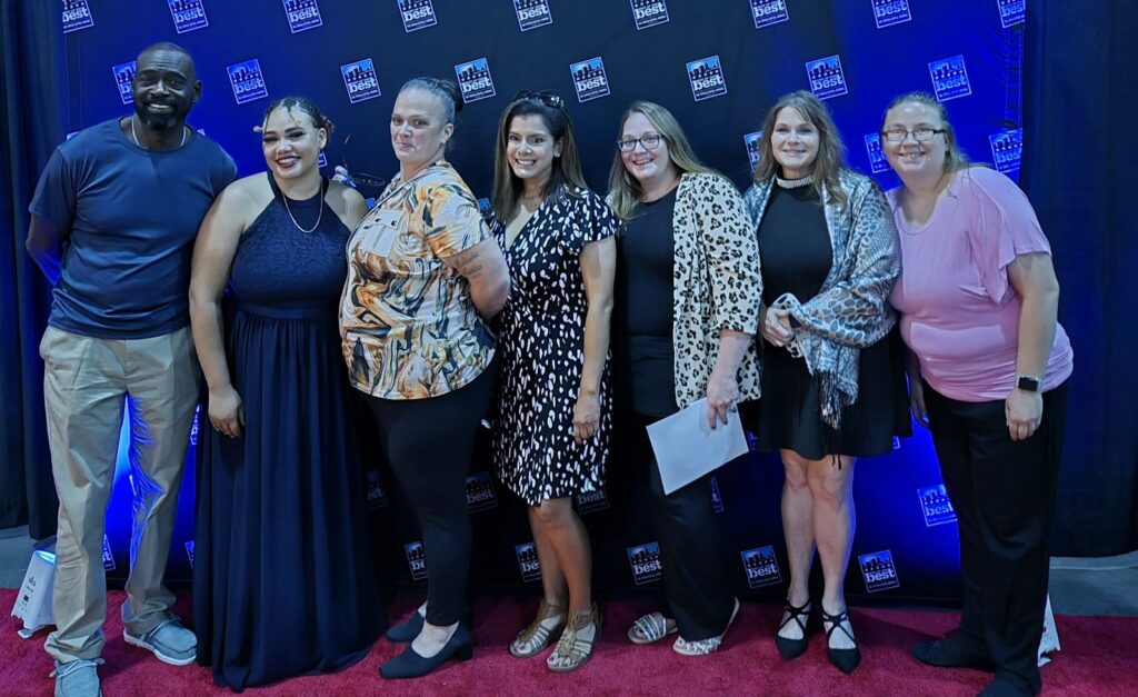 YMCA of Topeka Leadership lined up at the 2024 Best of Topeka Gala